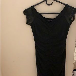 Long black dress . Forgot the name .